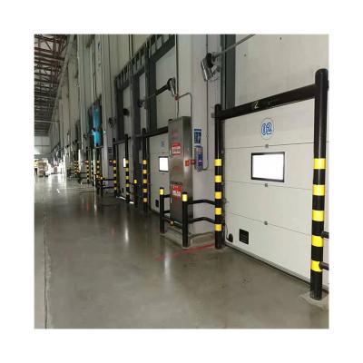 China Waterproof Industrial Workshop Vertical Logistics Warehouse Fast Electric Lift Gate for sale