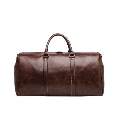 China Durable Luxury Brown Luggage Men Travel Genuine Cowhide Leather Tote Bag Multifunction Duffle Bag for sale