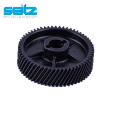 China Custom plastic helical gears from China OEM precision injection molding PA66 transmission parts for commercial printers for sale