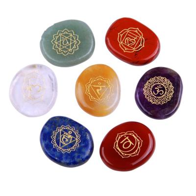 China 7 Pieces Engraved Healing Crystal Palm Chakra Meditation Stones for sale