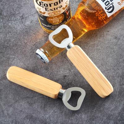 China Wooden Beer Bottle Opener Wooden Handle Stainless Steel Handle Bar Accessories Rustic Bottle Opener for sale