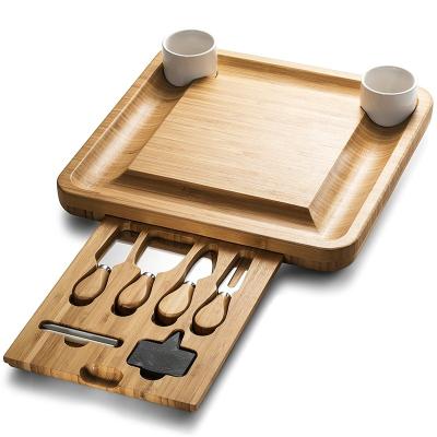 China Sustainable Bamboo Cheese Board Set With Cutlery Server And 2 Ceramic Bowls for sale