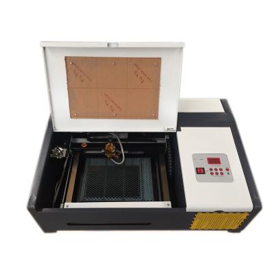 China Laser Engraving Small Laser Marking Machine For 3020 Stamps for sale