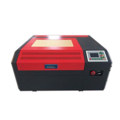 China Laser Engraving Low Price CO2 Laser Engraving Machine Phone Case Engraving Machine 4040 for sale