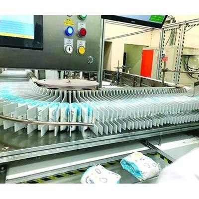 China Automatic Sanitary pad Making Machine Sanitary Napkin Ladies Pad Machine for sale