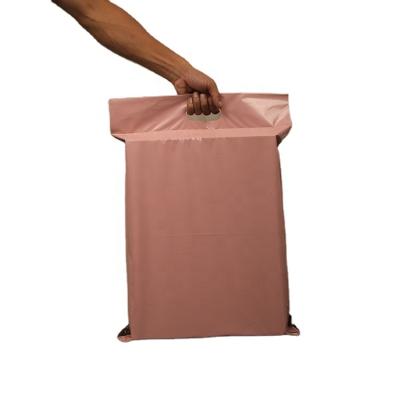 China Strong Adhesive / With Handle Quickly Deliver Envelope Plastic Bag Poly Mailer Bags Pink Mailer Plastic Bag With Handle for sale