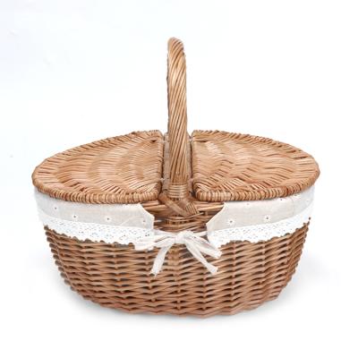 China KINGWILLOW Oval Handmade Wicker Willow Woven Picnic Basket Eco-friendly Hot Selling Custom Made Basket With Lid for sale