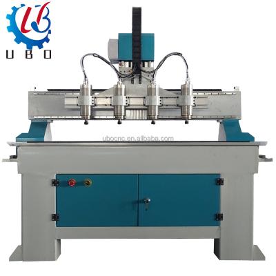 China Acrylic PVC Wood Engraving Cutting Multi Heads 4 Axis Door Router UBO Woodworking Cnc Engraver Woodworking Cnc Router Machine With Cooling Spindle water 2.2KW for sale