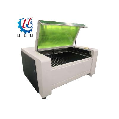 China Full-enclosed good price guaranteed quality portable fiber laser engraving machine for engraving metal cutting non-metal materials CO2 for sale