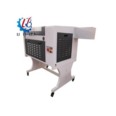 China CO2 Laser Engraving Machine Full-enclosed UBO Acrylic Wood Glass CNC Laser Cutting Machinery 6040 for sale