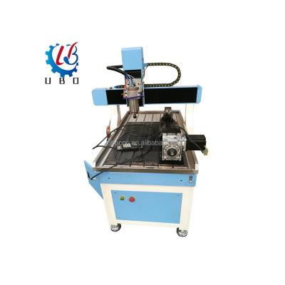 China Hotels Wood Router Milling Machine 4axis Advertising CNC Router 6090 Mini Wood Carving Cutting Engraving Machinery for sale