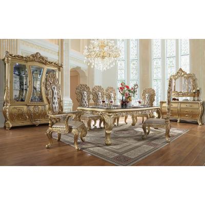 China Luxurious solid wood rococo metallic antique gold royal dining table sets with 8 chairs for sale