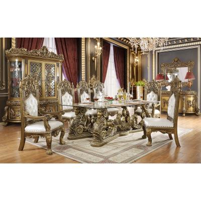 China Solid Wood Italian Hand Carving Rectangle Top Gilding Solid Wood Glass Dining Table 8 Seater Dining Set for sale