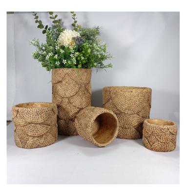 China Market View Modern Wholesale Cement Flower Planter Garden Pot Fan Bamboo Woven Flower Pots And Planters for sale