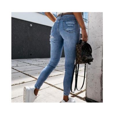 China New high quality autumn and winter thin pencil pants breathable waist ripped destroyed women's jeans for sale