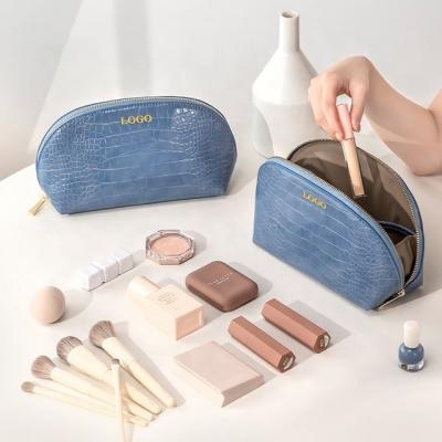 China Custom Fashion Logo Small Makeup Bag Leather Cosmetic Toiletry Bag For Women for sale