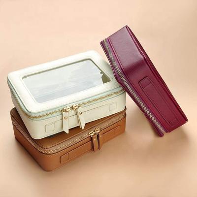 China Custom Logo Pu Leather Makeup Bag Travel Beauty Bag Multifunction Portable Clear Cosmetic Pouch Pouch Bag for sale