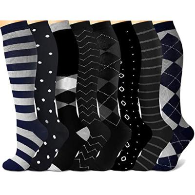 China Women Men Sustainable Compression Socks Elastic Sports Stockings Beautiful Leg Running Black White Classic Socks for sale