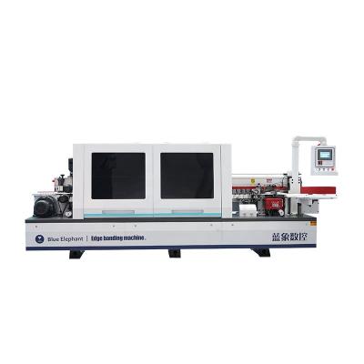 中国 Korea LS power generation CNC woodworking edge banding machine curved straight automatic edgebander for PVC 販売のため