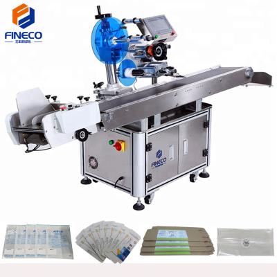 China FK812 CLOTHING Automatic Garment Sticker Bag Paper Label Flat Plastic Card Labeler Machine With After-sales Service The Automatic Driver for sale