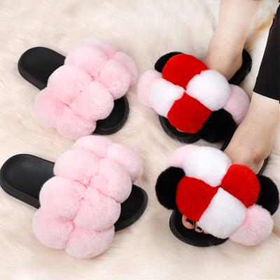 China Fashion trend fur ball fluffy fur slips fashionable newcomers slippers woman sandals 2021 sandals for women and ladies for sale