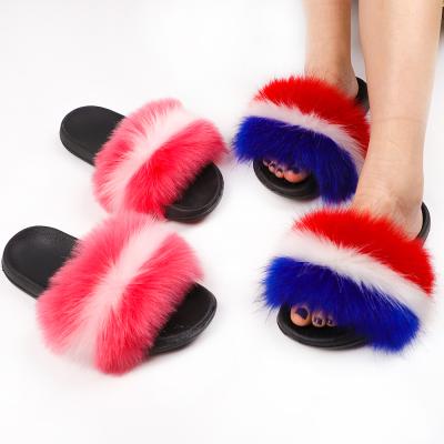 China 2021 Fashion Trend Hot Sale Cheap Slippers Wholesale Big Furry Soft Faux Fox Fur SlidesRaccoonfor Women for sale