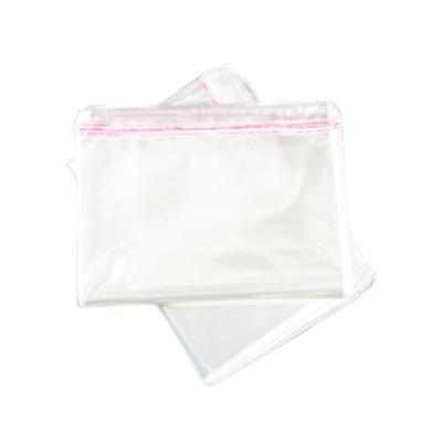 China Low MOQ Recyclable Custom Cellophane Poly Bag Packaging Opp Clear Plastic Poly Bag With Choking Warning Bag for sale