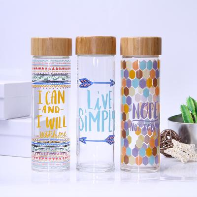 China 600ML Straight Outdoor Spill Proof Stocked Camping Single Wall Glass Water Bottle With Bamboo Lids for sale