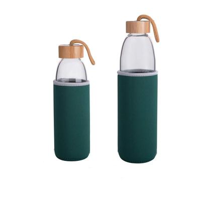 China 500ML/1000ML Stocked Gradient Color Single Wall Glass Water Bottle With Bamboo Cloth Lids And Sleeve for sale