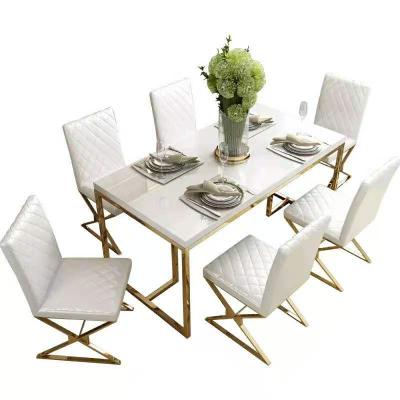 China (Other)Adjustable Cheap Dining Room Furniture Table Set Gloden Home White Glass Top Modern Dining Room Set for sale