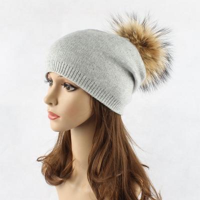 China New Wool Raccoon Fur Hat Women's Ball Knitted Hat Women's Solid Outdoor Warm Autumn And Winter Sweater Hat Waterproof for sale