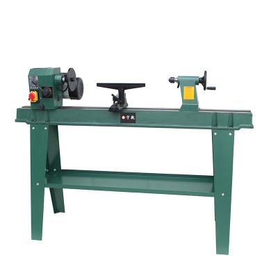 China Building Material Shops 1100W Mini Wood Turning Lathe Machine for Woodworking for sale