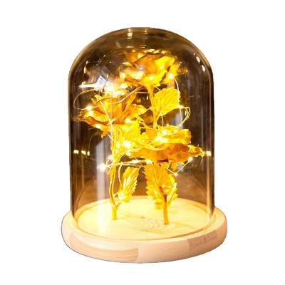 China Europe Hot Sale 24K Real Rose Glass Dome Wooden Base Preserved Gold LED Flowers Craft Glass Dome for sale