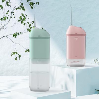 China 2021 Wireless Hotel Traveler Handle Mini Water Flosser Tooth Irrigator Oral Water Flosser for sale