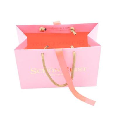 China Custom Logo Promotional Shopping Pink Matte Recyclable Laminated Retail Gift Bags for sale