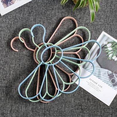 China Nordic New Fashion Fan Clip Scarf Frame Petal Hanger Multifunctional Tie Belt Storage Holder Holes Rack for sale