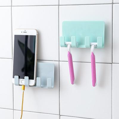 China 2021 new manufacturer supply magnetic creative paste mobile phone shelf and wall filler wall non marking storage hook for sale