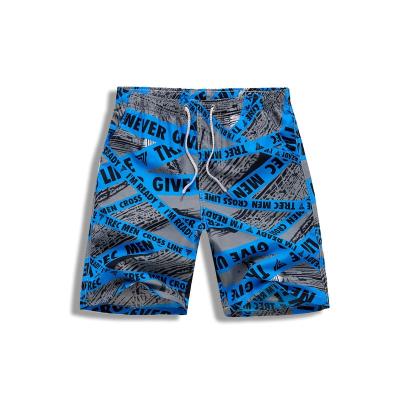 China Anti-wrinkle 2022 new fashion men's loose beach printing shorts Hawaiian style male surfing quick-drying shorts plus size five point casual shorts for sale