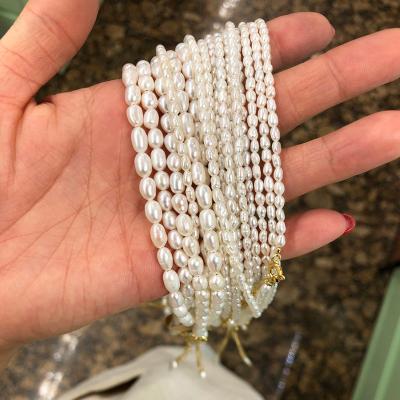 China Environmental Friendly Fashion 925 Sterling Silver 18K Gold Plated Rice Natural Freshwater Pearl Clavicle Beaded Necklace For Women for sale