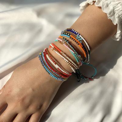 China Environmentally Friendly Bohemian Handmade Multi Colored Layer String String Woven Boho Beaded Bracelets For Women for sale