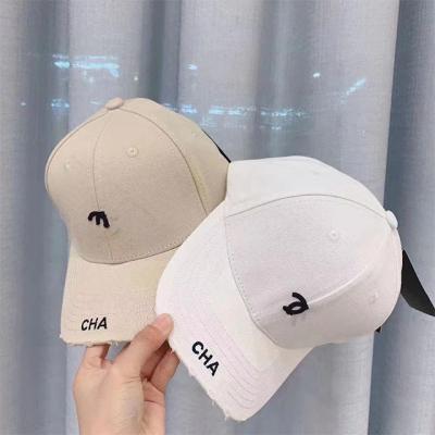 China 2022 Fashion Designer Famous Brands Luxury Hats Designer Hole Letter Embroidery Broken Hats for sale