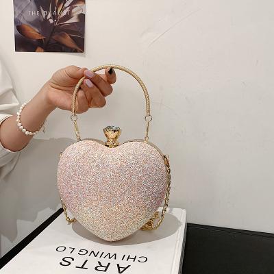 China 2021 Latest Lady Girls Fashion Luxury Lady Shoulder Hand Bag Heart Shape Cute Sequined Purses For Women for sale