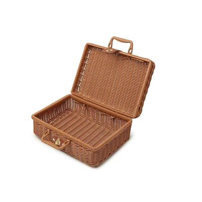 China Custom Viable Luxury Cosmetic Natural Handmade Handbag Rattan Picnic Bag Simple Weaving Basket With Handle for sale