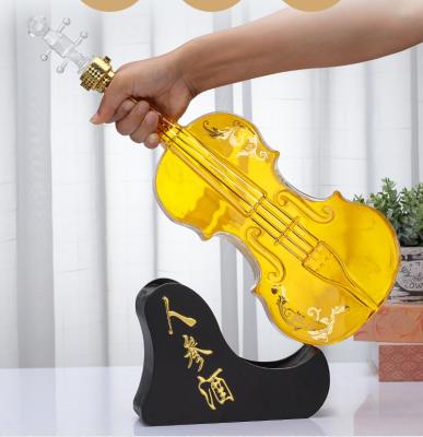 China Synthetic Wine Design Violin Shaped Spirit Whiskey Bottle Glass 1L 1000ml Liquor Vodka Bottles With Cap Glass Corks With Wooden Base for sale