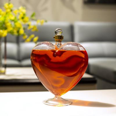 China Heart Shape Glass Love Wine 1000ml Wine Whiskey Decanter Wedding Glass Bottle With Cork for sale