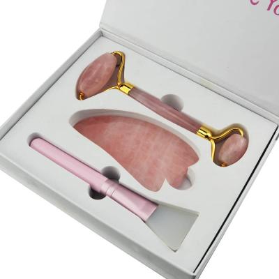 China Whitening Anti Aging Therapy Pink Rose Natural Quartz Roller Rose Quartz Roller Gua Sha for sale