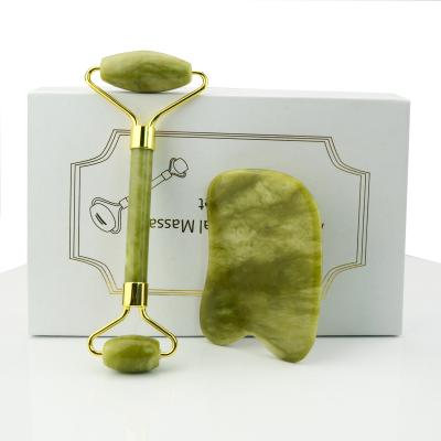 China Hot Selling Xiuyan Hand Held Jade Roller For Face Gemstone Jade Face Roller Massage for sale