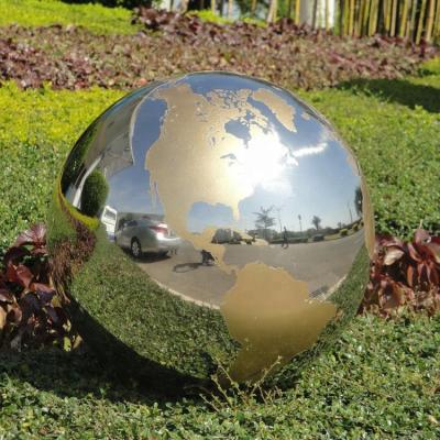 China Gnee Garden Polished Metal Sphere Sculpture World Globe Sculpture Handmade for sale