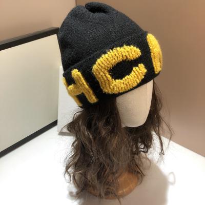 China Winter Woman COMMON Hat Beanies With Embroidery Hat Custom Warm Soft Waxy Wool Towel Letter Embroidered Knitted Hat for sale