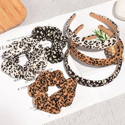 China 2021 fashion newcomer american wholesale customize leopard print headband and winter polyester scrunchies set woman for sale